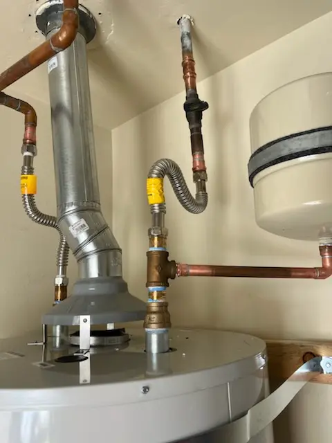 Water heater installation and plumbing repair in Walton